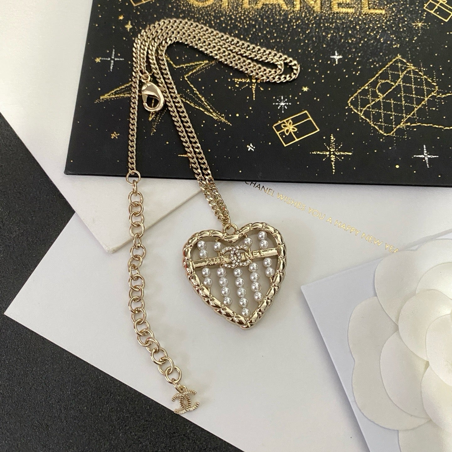 Coco crystal curve heart necklace