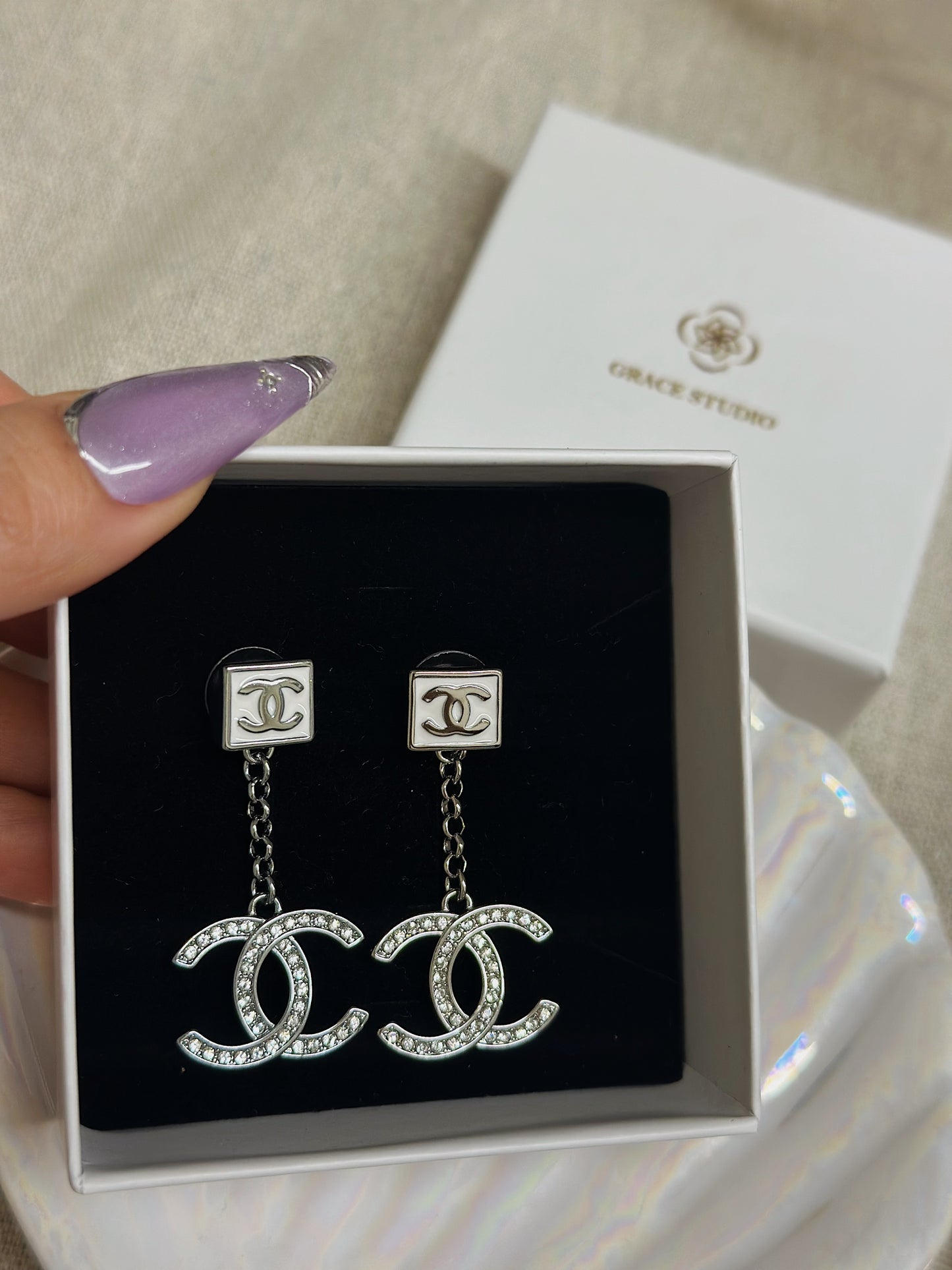 Cc Dangling earrings