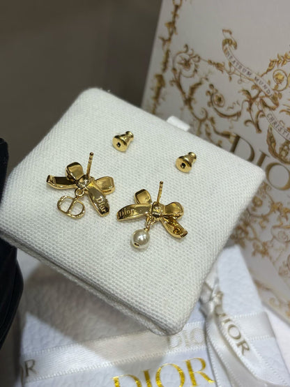 Dia Crystal Bow & Pearl Asymmetric Earrings