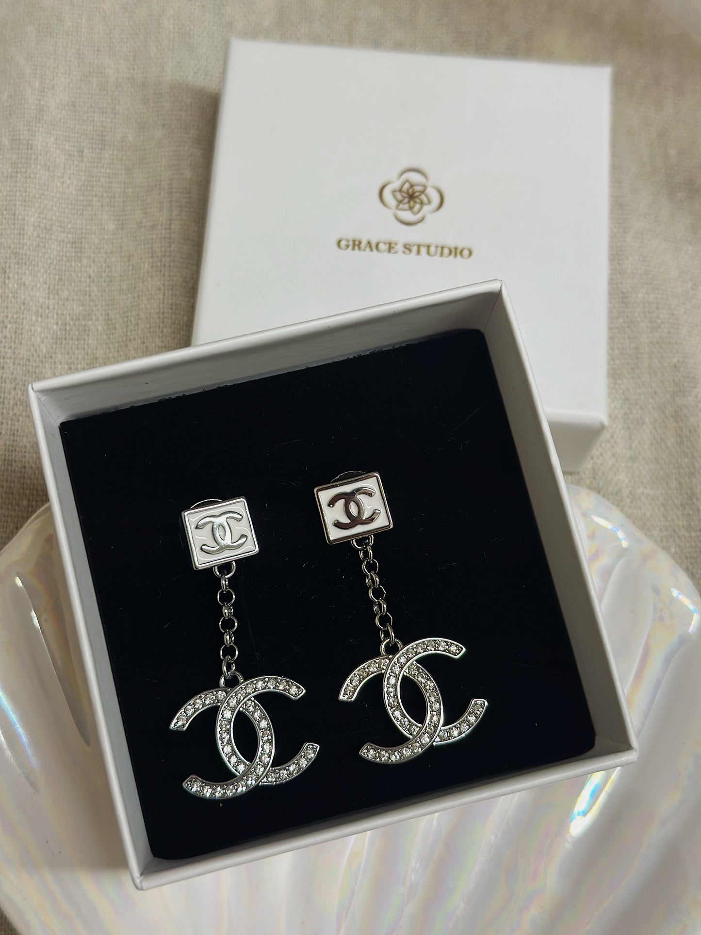 Cc Dangling earrings