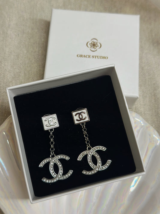 Cc Dangling earrings