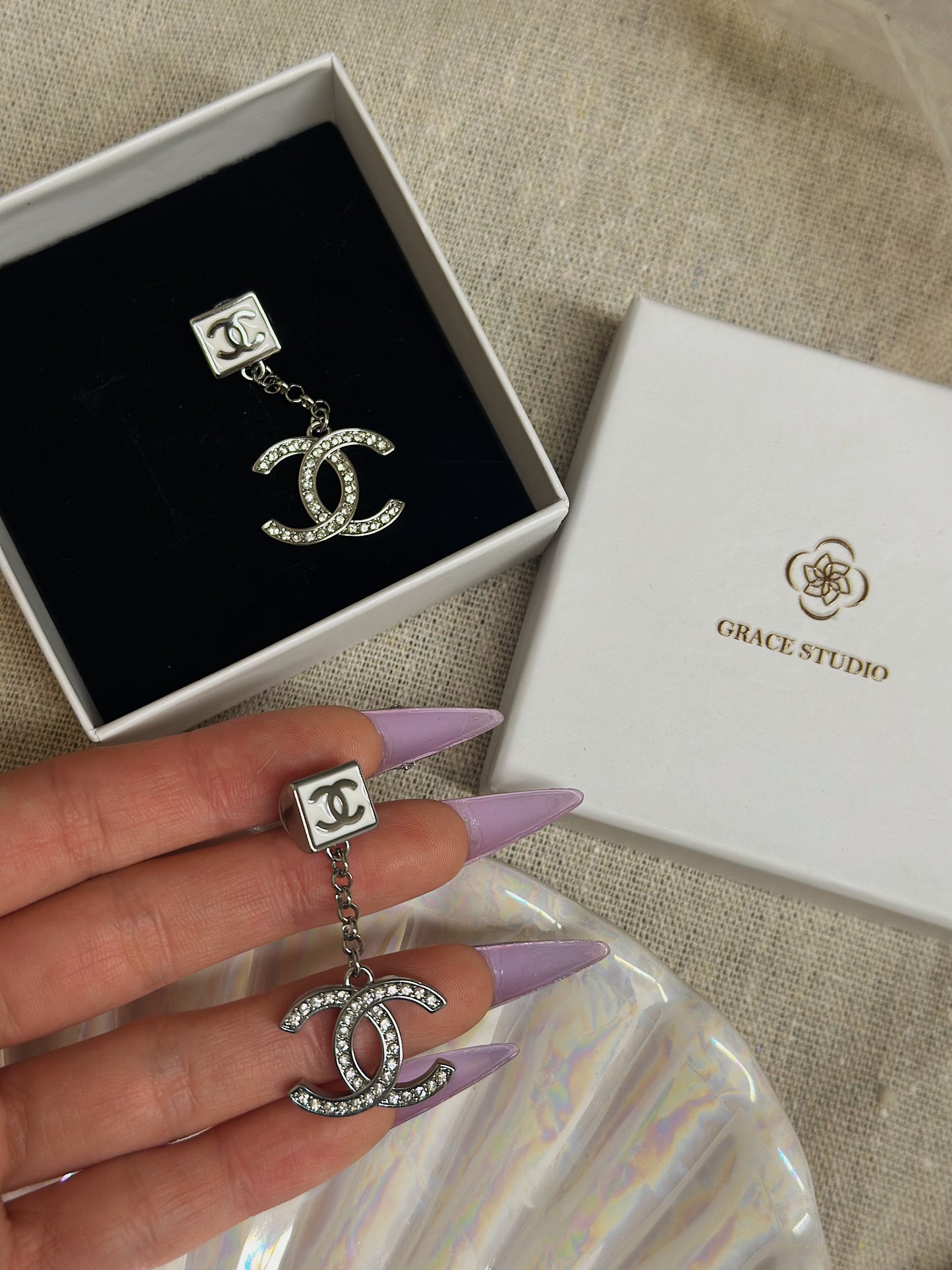 Cc Dangling earrings