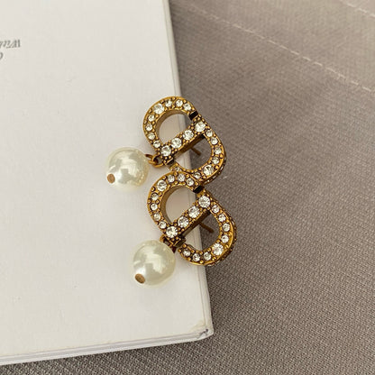 Dicey emblem earrings