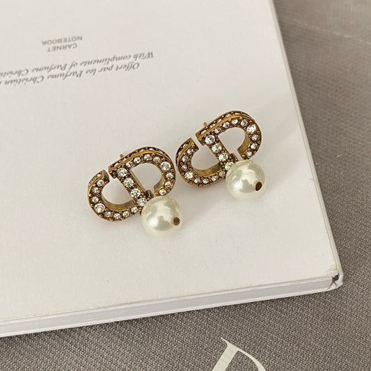 Dicey emblem earrings