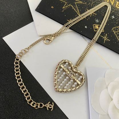 Coco crystal curve heart necklace