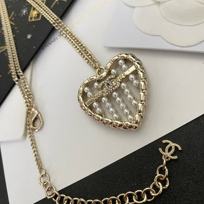 Coco crystal curve heart necklace