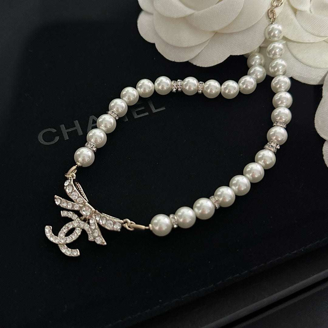 Coco Pearl & Bow Crystal Necklace