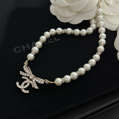 Coco Pearl & Bow Crystal Necklace