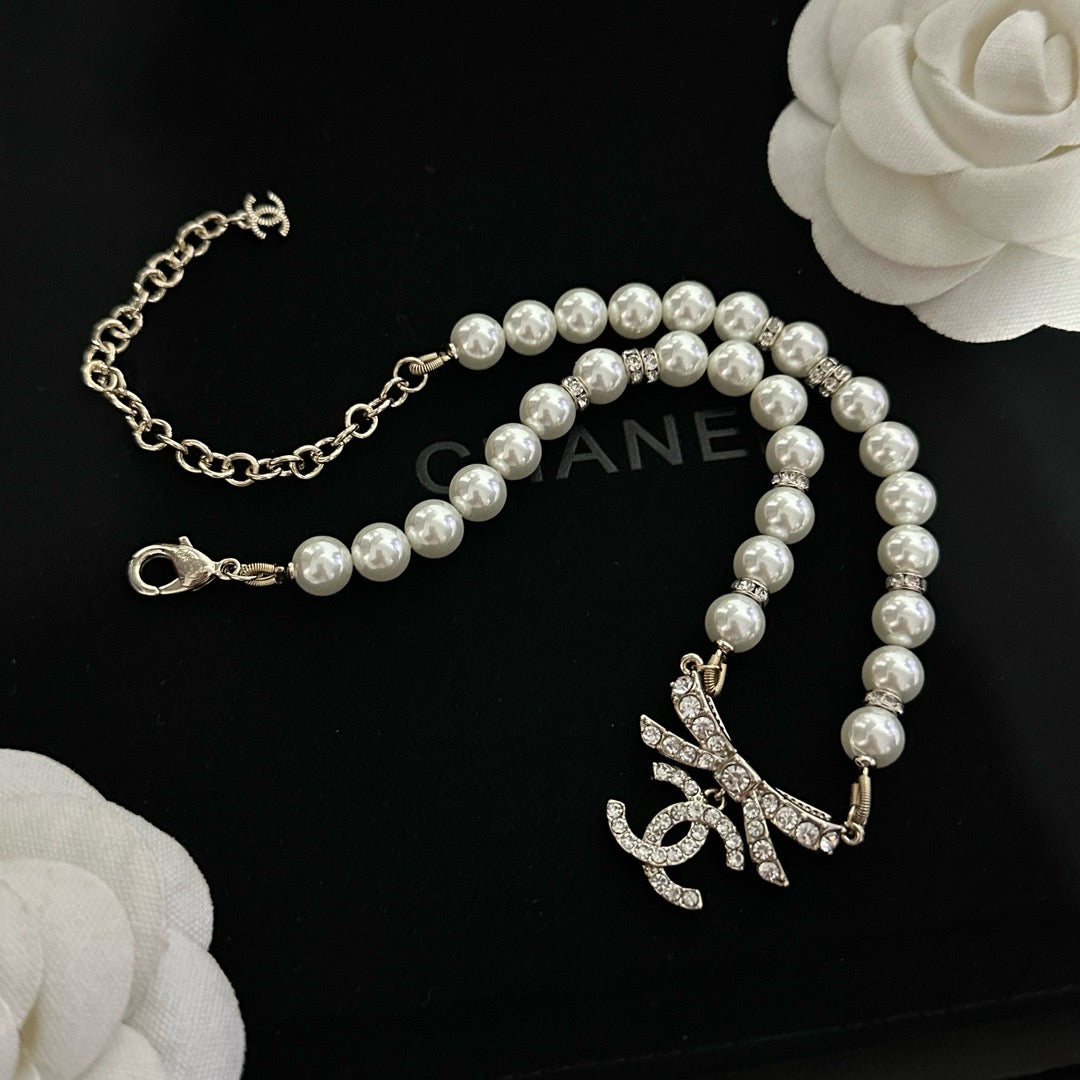 Coco Pearl & Bow Crystal Necklace