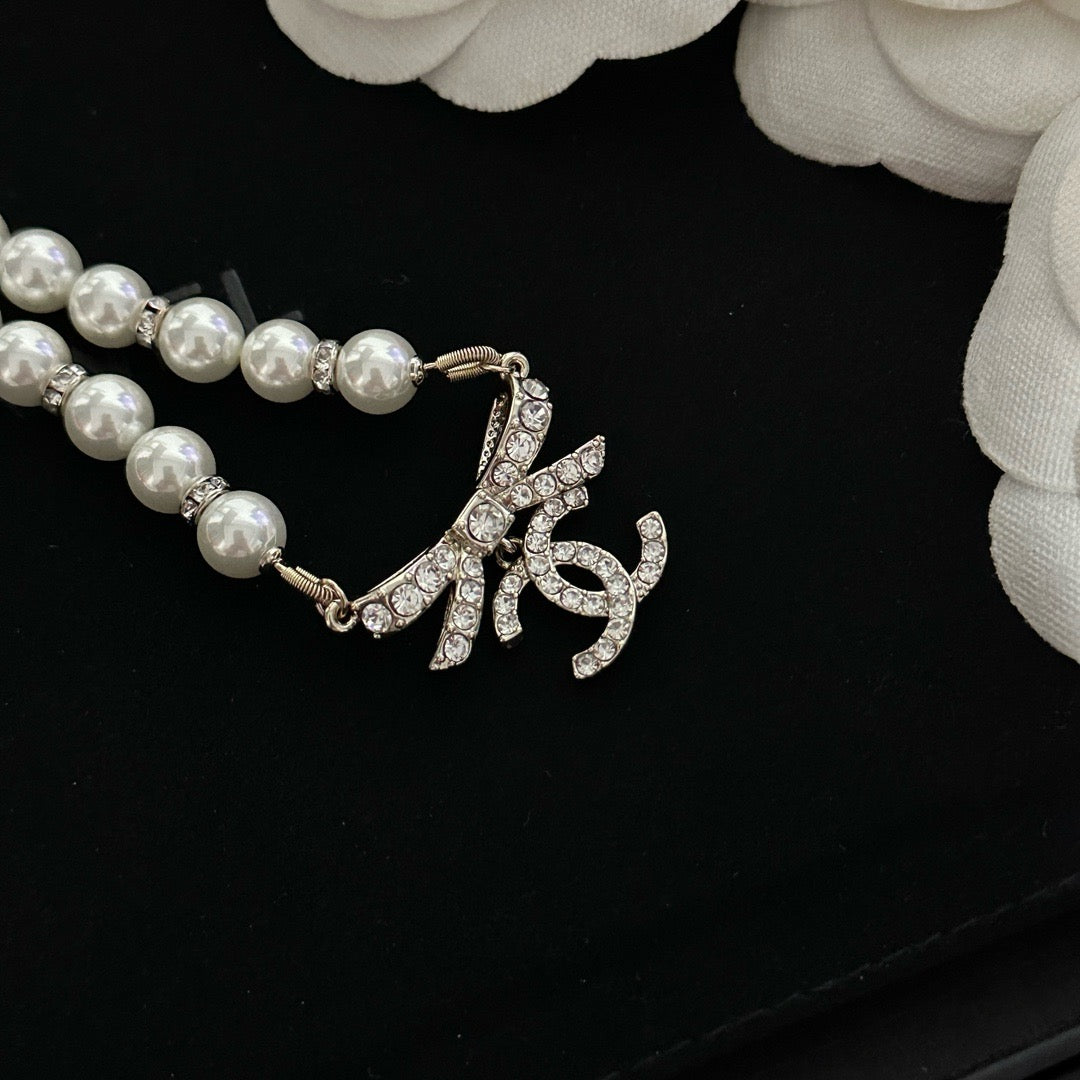Coco Pearl & Bow Crystal Necklace