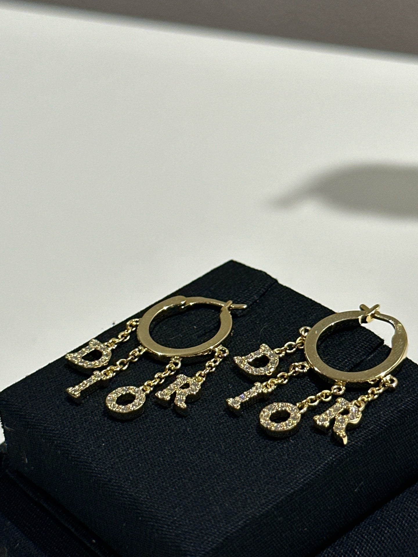 Dio logo hoop earrings