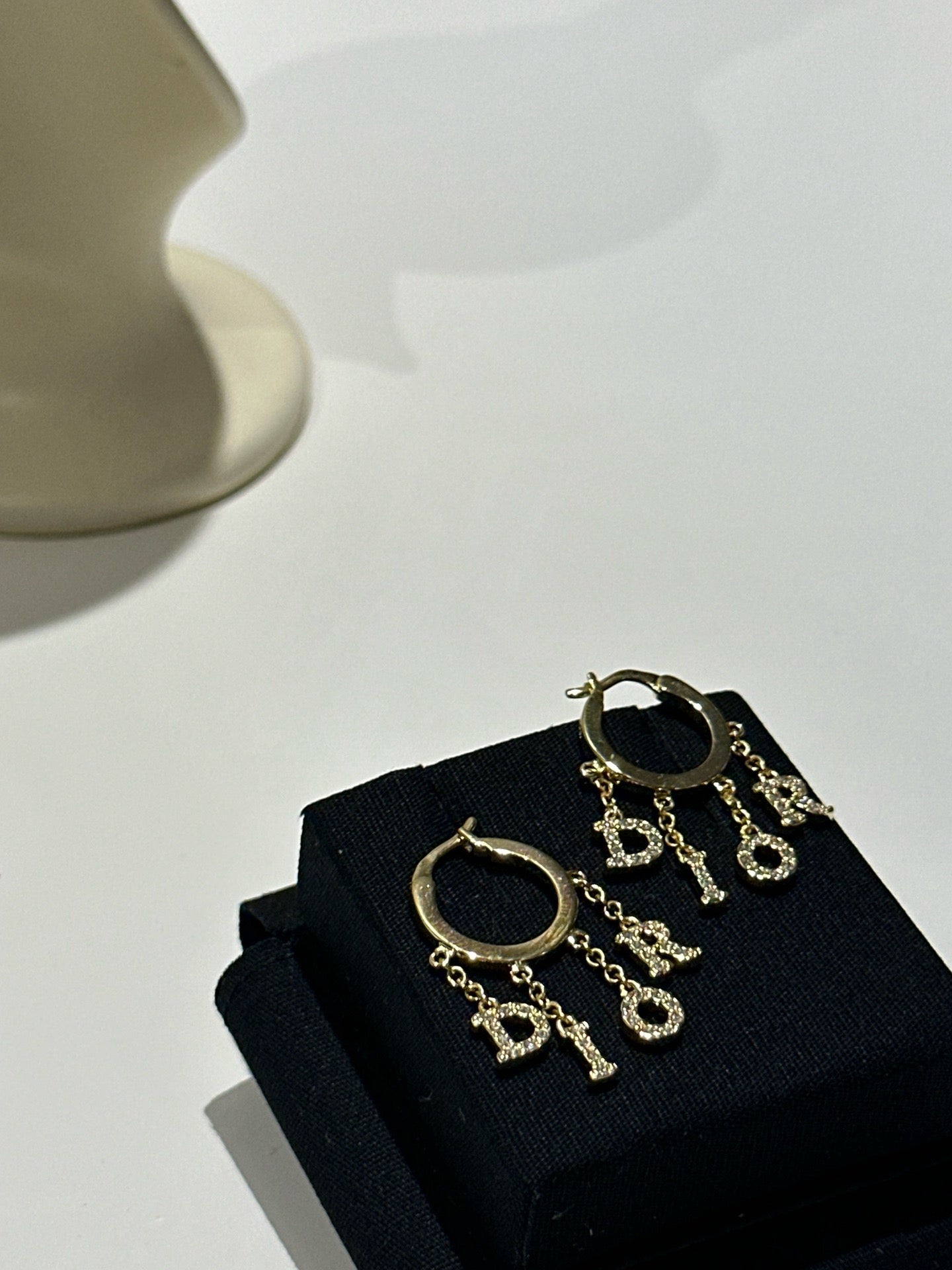 Dio logo hoop earrings