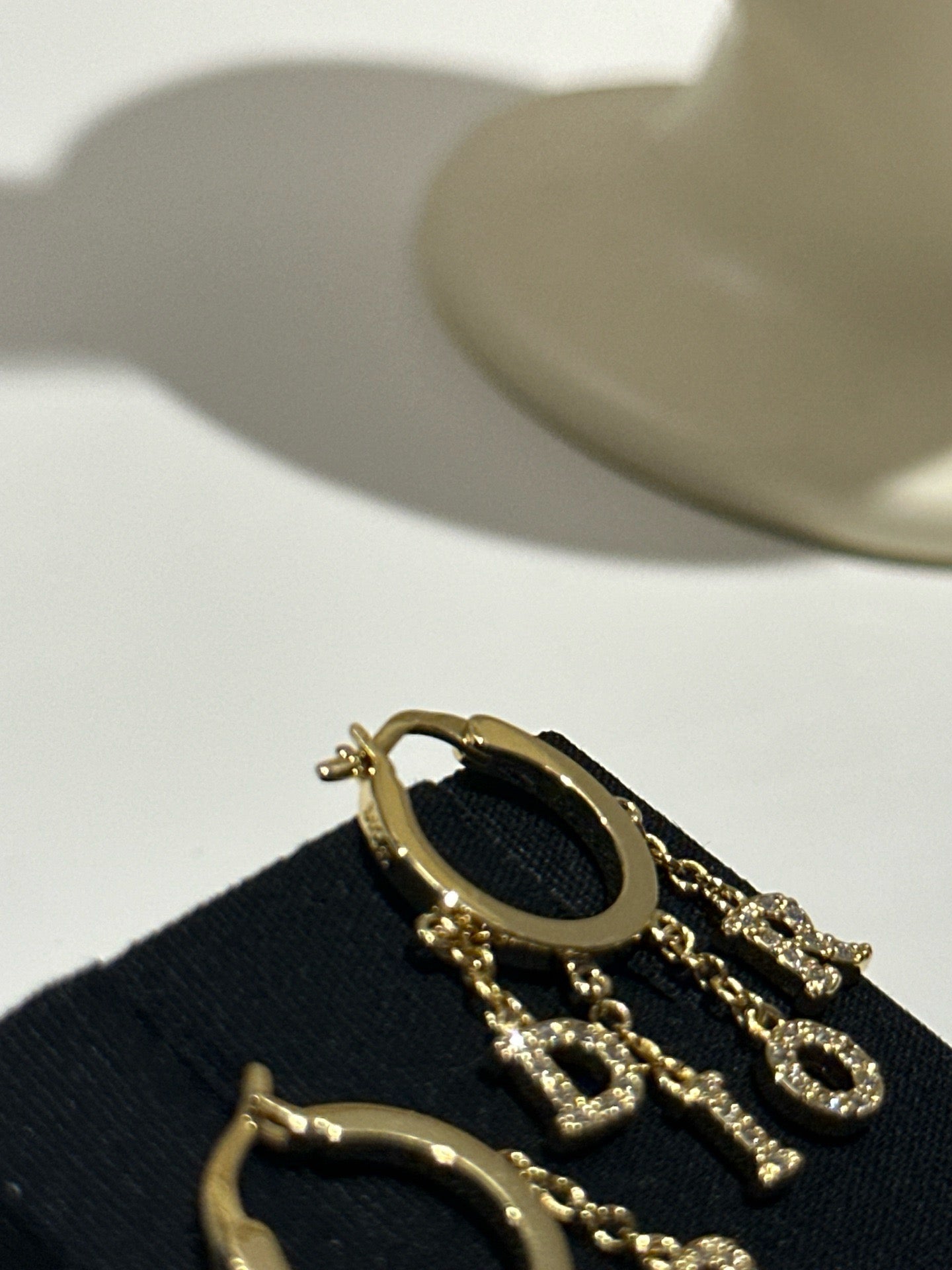 Dio logo hoop earrings