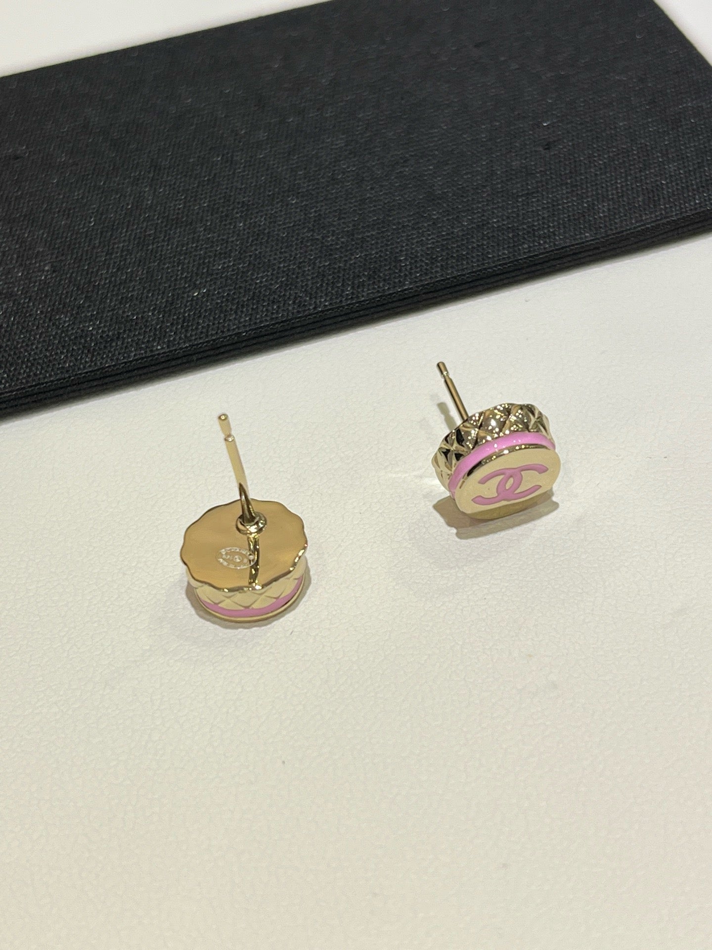 CC emblem earrings