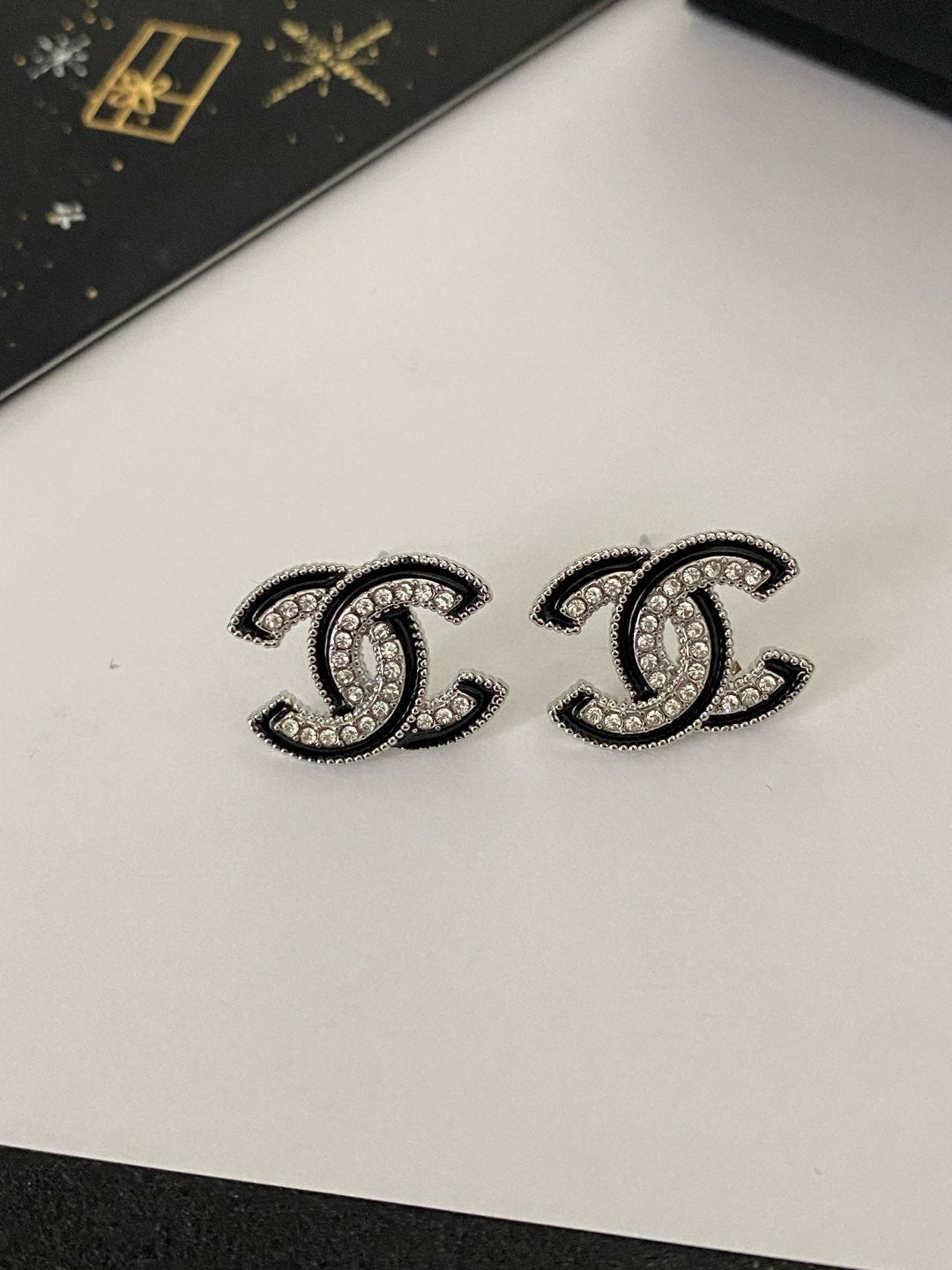 CC stud earrings