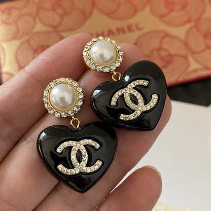 Coco crystal glow heart earrings