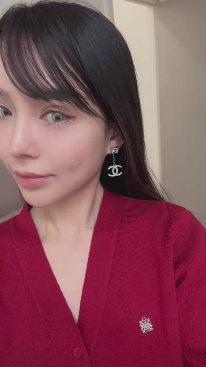 Cc Dangling earrings